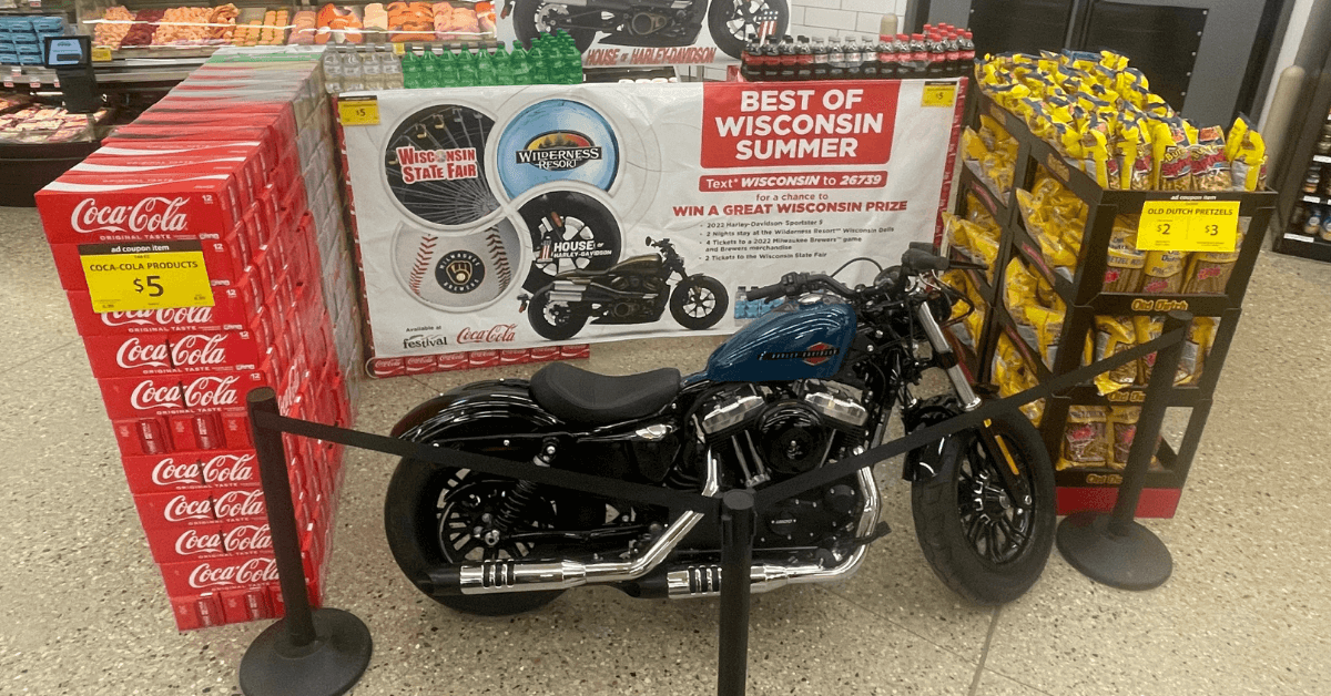 motorcycle surrounded by soda and pretzels