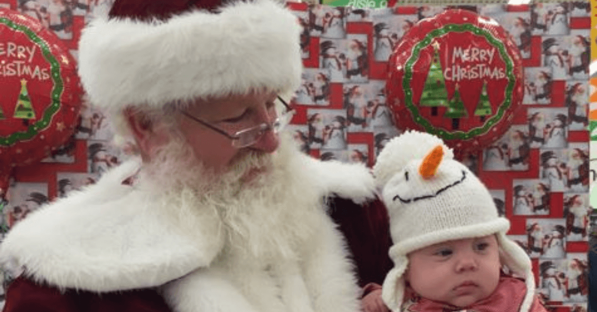 santa holding baby girl