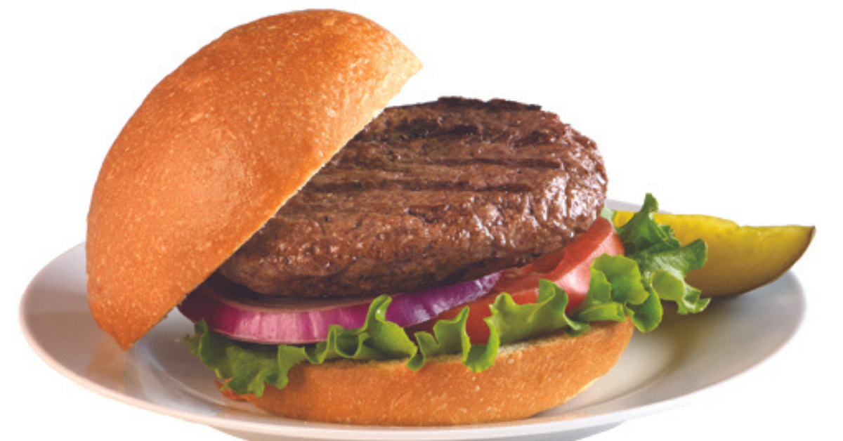Hamburger on bun with lettuce, tomato slice, and onion slice
