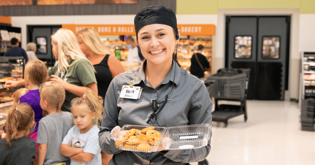 associate holding cookies